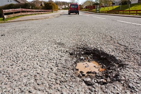 Pot holes: the road's speed bumps from hell.